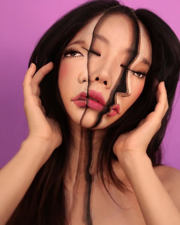 Nghệ sĩ Hàn Quốc Dane Yun, người vẽ ảo tưởng trên cơ thể của mình. - Sputnik Việt Nam