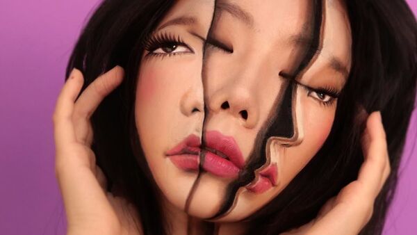 Nghệ sĩ Hàn Quốc Dane Yun, người vẽ ảo tưởng trên cơ thể của mình. - Sputnik Việt Nam