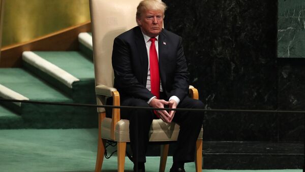 U.S. President Donald Trump sits in the chair reserved for heads of state before delivering his address during the 73rd session of the United Nations General Assembly at U.N. headquarters in New York, U.S., September 25, 2018 - Sputnik Việt Nam