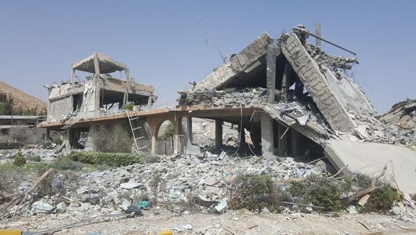 Исследовательский центр в Сирии, разрушенный в результате авиаударов коалиции США и их союзников - Sputnik Việt Nam