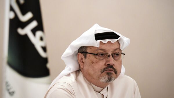 In this file photo taken on December 15, 2014, general manager of Alarab TV, Jamal Khashoggi, looks on during a press conference in the Bahraini capital Manama. - Sputnik Việt Nam