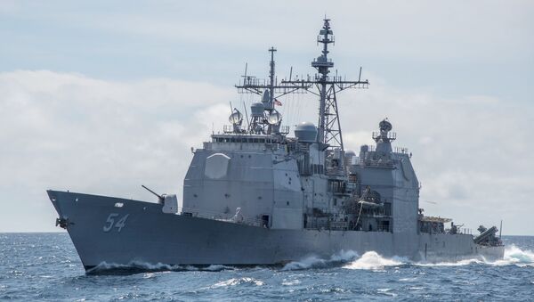 This Mar. 6, 2016, file photo provided by the U.S. Navy, shows the Ticonderoga-class guided-missile cruiser USS Antietam (CG 54) sails in the South China Sea. China says it dispatched warships to identify and warn off a pair of U.S. Navy vessels sailing near one of its island claims in the South China Sea. A statement on the Defense Ministry’s website said the Arleigh Burke class guided-missile destroyer USS Higgins and Ticonderoga class guided-missile cruiser USS Antietam entered waters China claims in the Paracel island group “without the permission of the Chinese government.” - Sputnik Việt Nam