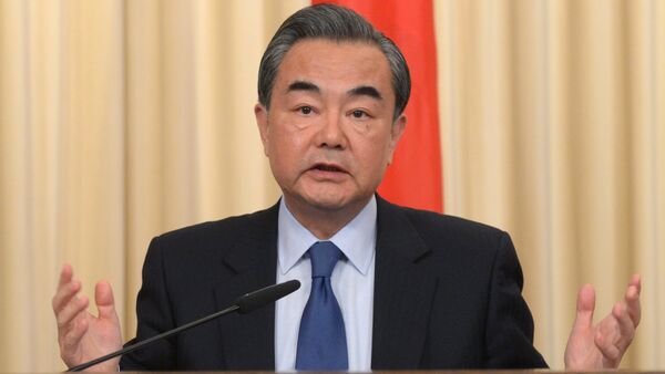 Foreign Minister of the People's Republic of China Wang Yi during a joint press conference with Russian Foreign Minister Sergey Lavrov on the results of their meeting in Moscow - Sputnik Việt Nam