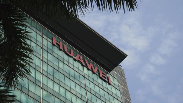 In this March 13, 2018, photo, the logo of Huawei is displayed at its headquarters in Shenzhen in southern China's Guangdong Province. - Sputnik Việt Nam