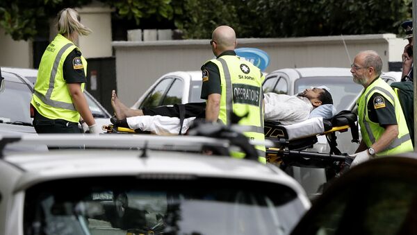 Ambulance staff take a man from outside a mosque in central Christchurch, New Zealand, Friday, - Sputnik Việt Nam