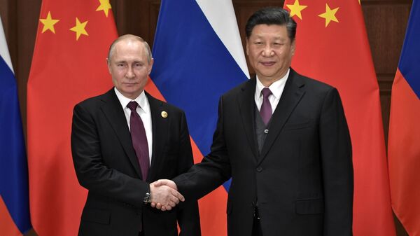 Tổng thống Nga Vladimir Putin  và Chủ tịch Trung Quốc Tập Cận Bình - Sputnik Việt Nam