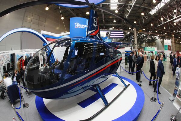 Trực thăng thương mại năm chỗ đa năng hạng nhẹ do công ty Robinson Helipcoter sản xuất, được trình bày tại Triển lãm quốc tế HeliRussia - 2019 ở «Crocus Expo» - Sputnik Việt Nam