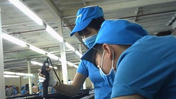 Lắp ráp tivi tại Nhà máy Asanzo trong Khu công nghiệp Vĩnh Lộc, Q.Bình Tân, TP.HCM - Sputnik Việt Nam