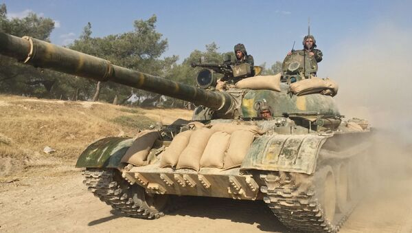 Các chiến sĩ xe tăng của quân đội Syria ở tỉnh Hama - Sputnik Việt Nam