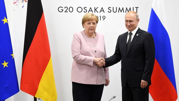 Ông Putin và bà Merkel - Sputnik Việt Nam