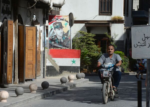 Người dân trên đường phố Damascus - Sputnik Việt Nam