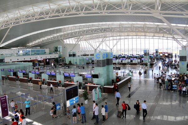 Khu vực làm thủ tục sân bay Nội Bài Khu vực làm thủ tục sân bay Nội Bài - Sputnik Việt Nam