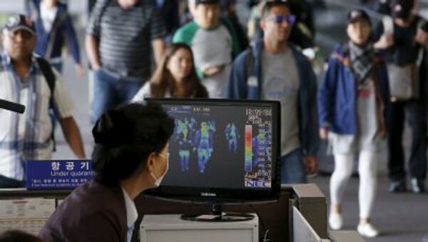 Проверка пассажиров через тепловизионную камеру в аэропорту Инчхон - Sputnik Việt Nam