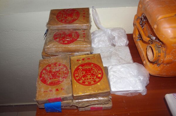Hơn 20 bánh heroin in chữ Trung Quốc trôi dạt vào bờ biển Quảng Nam Hơn 20 bánh heroin in chữ Trung Quốc trôi dạt vào bờ biển Quảng Nam - Sputnik Việt Nam