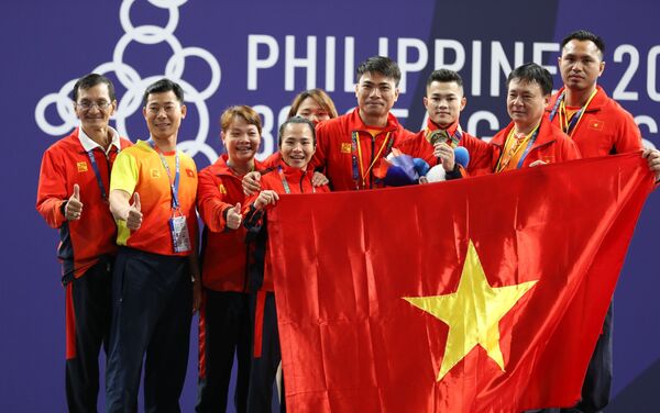 Lại Gia Thành giành tấm Huy chương Vàng ở hạng cân 55kg nam môn Cử tạ - Sputnik Việt Nam