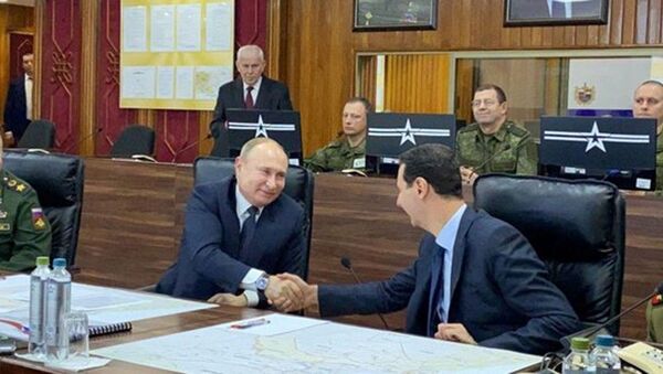 Tổng thống Nga Vladimir Putin và Tổng thống Syria Bashar Assad trong cuộc gặp tại Damascus - Sputnik Việt Nam