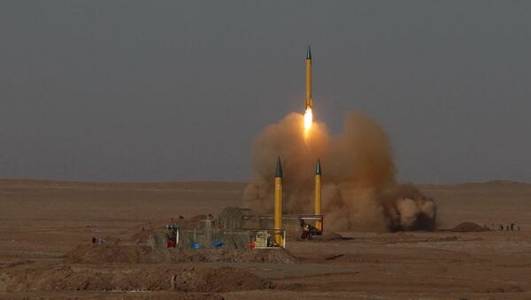 In this picture released by the Iranian Fars News Agency, asurface-to-surface missile is launched during the Iranian Revolutionary Guards maneuver in an undisclosed location in Iran, Tuesday, July 3, 2012 - Sputnik Việt Nam