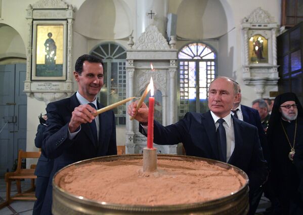 Tổng thống Nga Vladimir Putin và Tổng thống Syria Bashar Assad tại Nhà thờ Đức Trinh Nữ Maria, Damascus - Sputnik Việt Nam