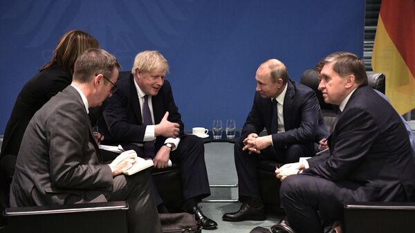 Cuộc gặp giữa hai ông Putin và Johnson ở Berlin. - Sputnik Việt Nam