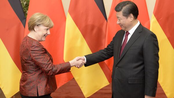 Bà Merkel và ông Tập Cận Bình. - Sputnik Việt Nam
