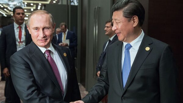 Tổng thống Nga Vladimir Putin và Chủ tịch Trung Quốc Tập Cận Bình tại hội nghị thượng đỉnh G20 ở Thổ Nhĩ Kỳ - Sputnik Việt Nam