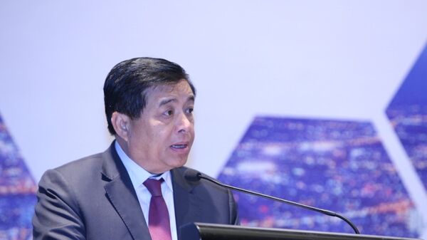 Bộ trưởng Bộ Kế hoạch và Đầu tư Nguyễn Chí Dũng phát biểu tại hội nghị - Sputnik Việt Nam