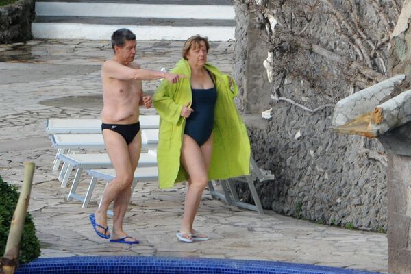Bà Angela Merkel cùng chồng trong kỳ nghỉ ở Italy - Sputnik Việt Nam