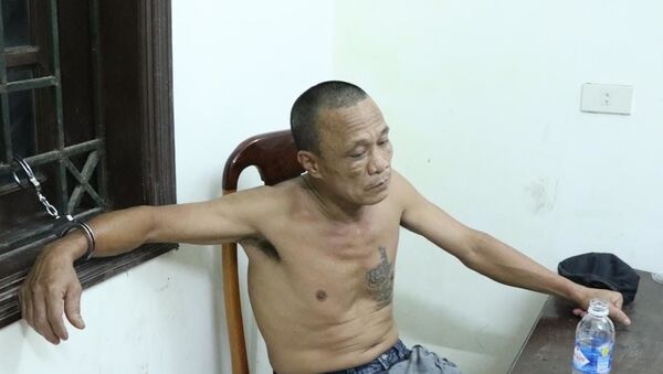 Nghi phạm Nguyễn Doãn Vạn bị bắt giữ khi đang lẩn trốn cách hiện trường gây án 15 km. - Sputnik Việt Nam