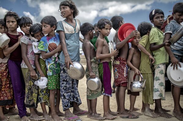 Bức ảnh “Sau khi di cư” của nhiếp ảnh gia Bangladesh K M Asad, Giâỉ Nhất cuộc thi ảnh Pink Lady® Food Photographer of the Year 2020 - Sputnik Việt Nam