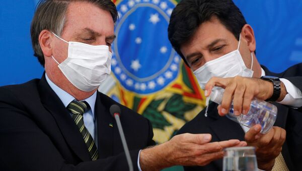 Tổng thống Brazil Jair Bolsonaru và Luis Henrique Mandetta trong một hội nghị ở Brazil - Sputnik Việt Nam