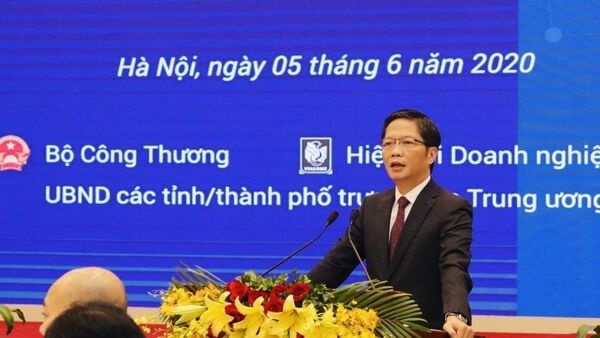 Bộ trưởng Bộ Công Thương Trần Tuấn Anh phát biểu tại hội nghị.  - Sputnik Việt Nam