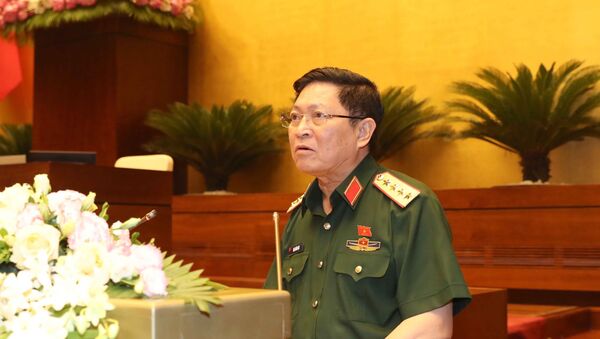 Bộ trưởng Bộ Quốc phòng Ngô Xuân Lịch giải trình ý kiến của đại biểu Quốc hội. - Sputnik Việt Nam